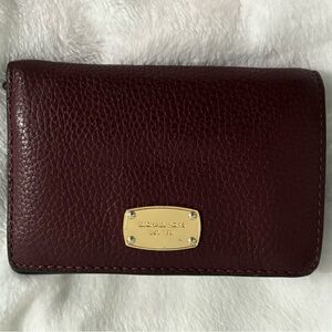 Burgundy Michael Kors bifold wallet